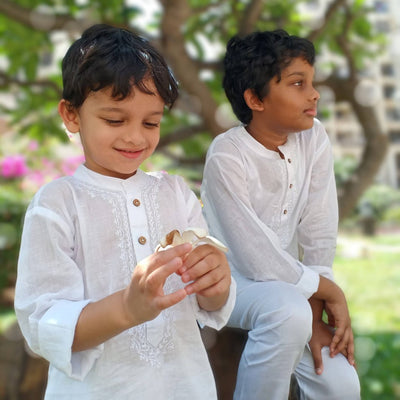 boys in white cotton malmal kurta