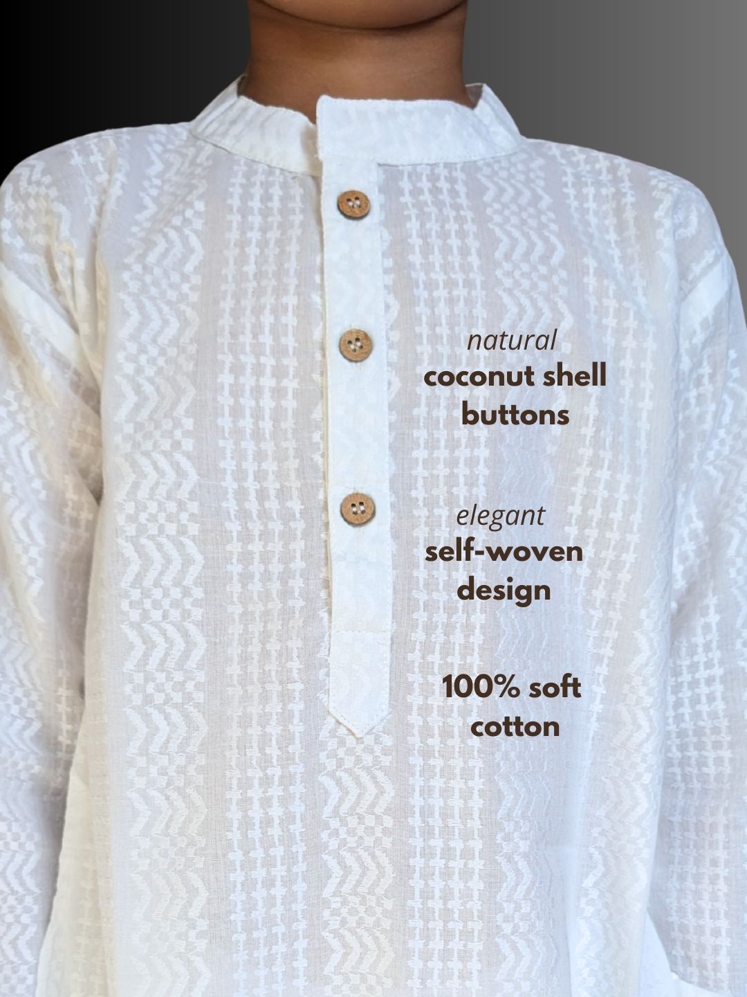White cotton kurta with coconut shell buttons on a gray background