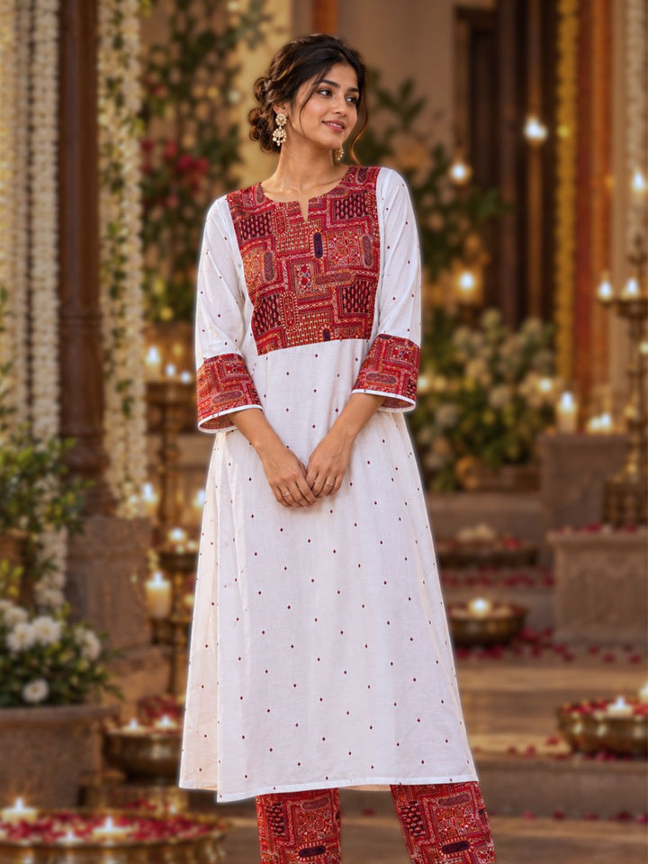 Woman in off-white Utsav cupro silk kurta with maroon embroidered yoke and cuffs, maroon buti and maroon embroidered pants – photo 4 – Tura Turi