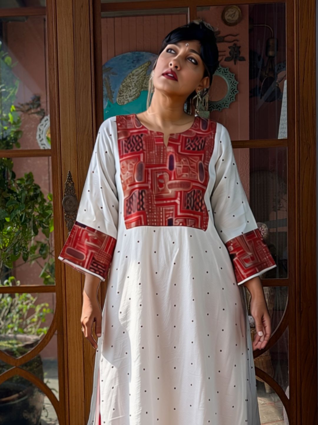 Woman in off-white Utsav cupro silk kurta with maroon embroidered yoke and cuffs, maroon buti and maroon embroidered pants – photo 7 – Tura Turi