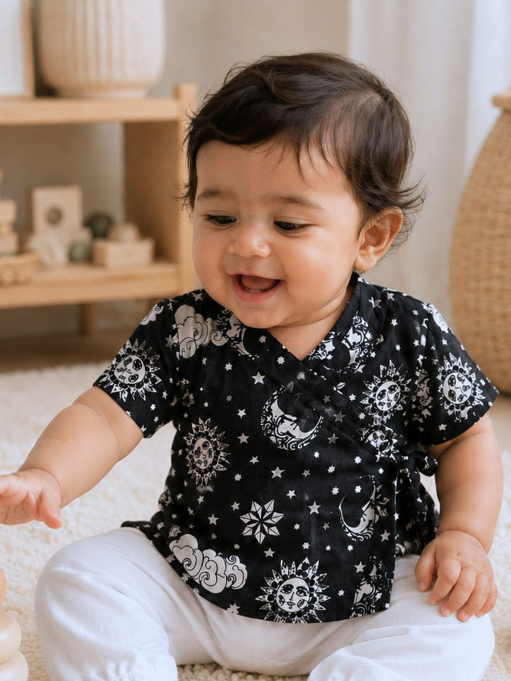 Nayantaara Black cotton muslin baby jhabla, close view of the print – Tura Turi