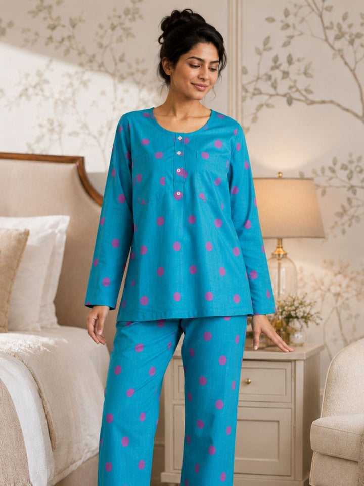 Front view of the teal blue polka dot no-bra cotton night suit for women by Tura Turi