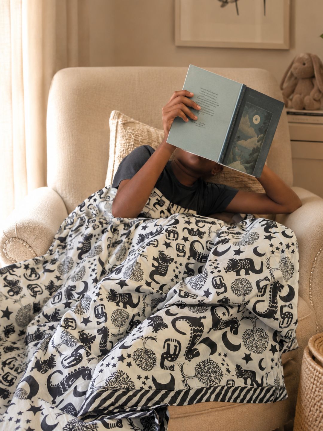 Close-up of hand block-print detail and black-and-white striped border on Tura Turi cotton kids blanket