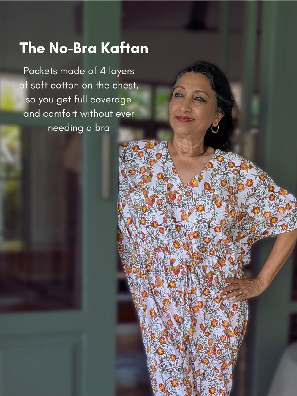 Woman wearing a floral No-Bra Kaftan with text describing its features.