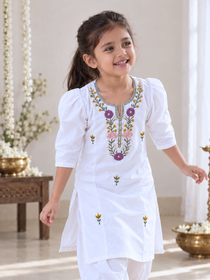 Comfortable white pure cotton kurta for girls with handcrafted-style floral embroidery for everyday celebrations
