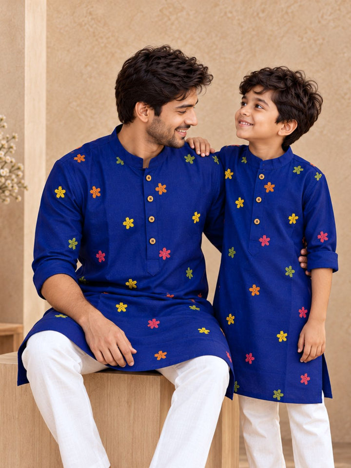 father son twinning kurta in royal blue colour with multicolour embroidery.
