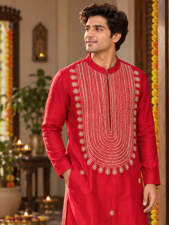 Man wearing red cupro silk Tashan festive kurta with beige-gold resham embroidery