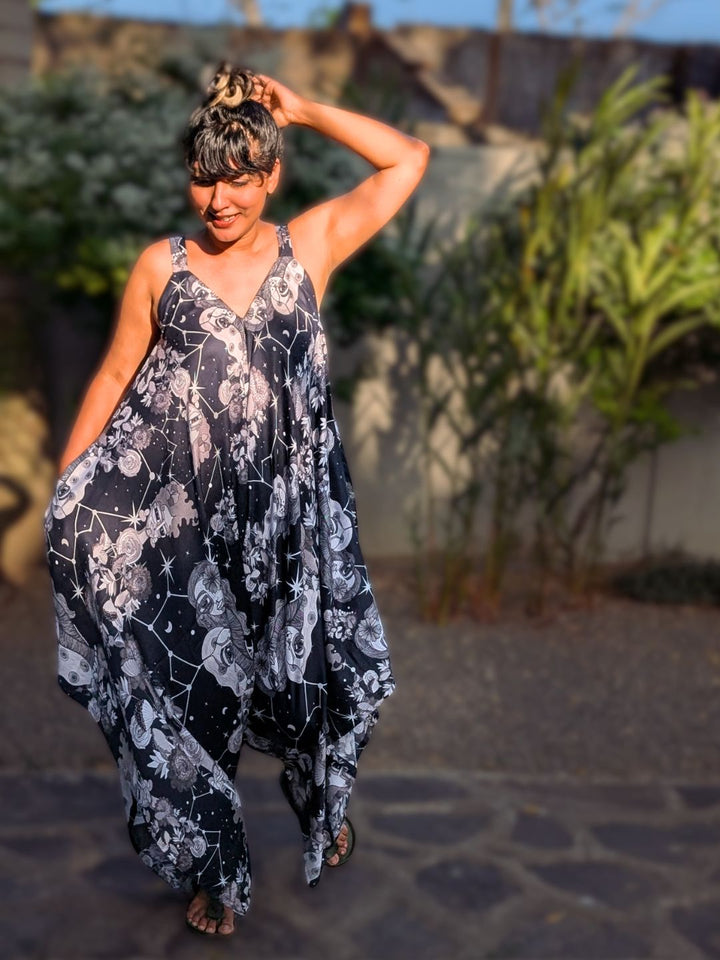 Black Women’s floral cotton jumpsuit with flowy asymmetrical hem and pockets
