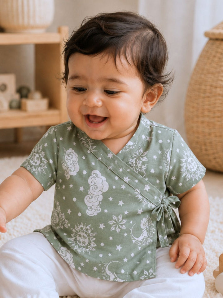 Nayantaara Sage Green cotton muslin baby jhabla with side tie-up dori – Tura Turi