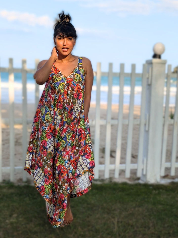 Resort wear cotton jumpsuit with relaxed drape and flowing silhouette
