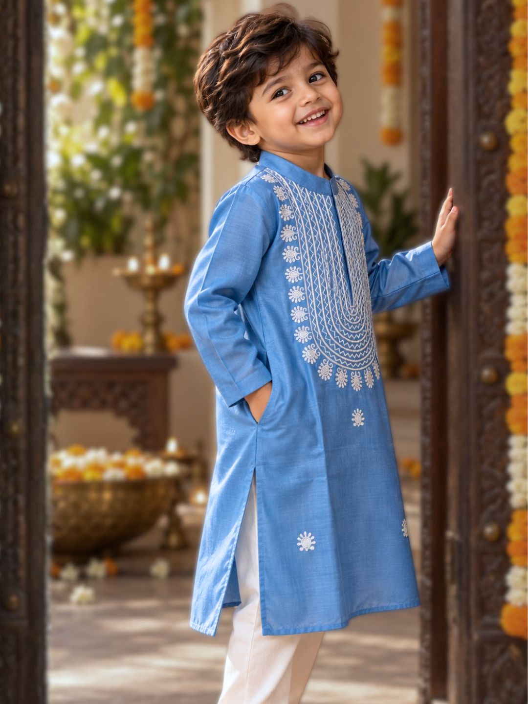 Young boy in festive diwali silk embroidered kurta in french blue