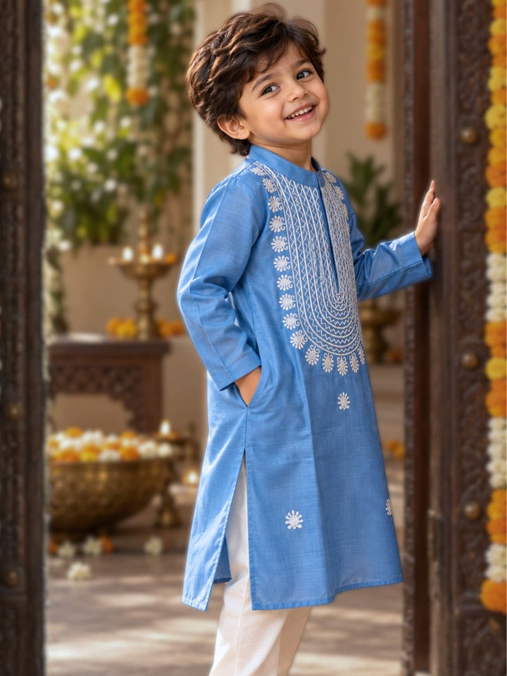 Young boy in festive diwali silk embroidered kurta in french blue