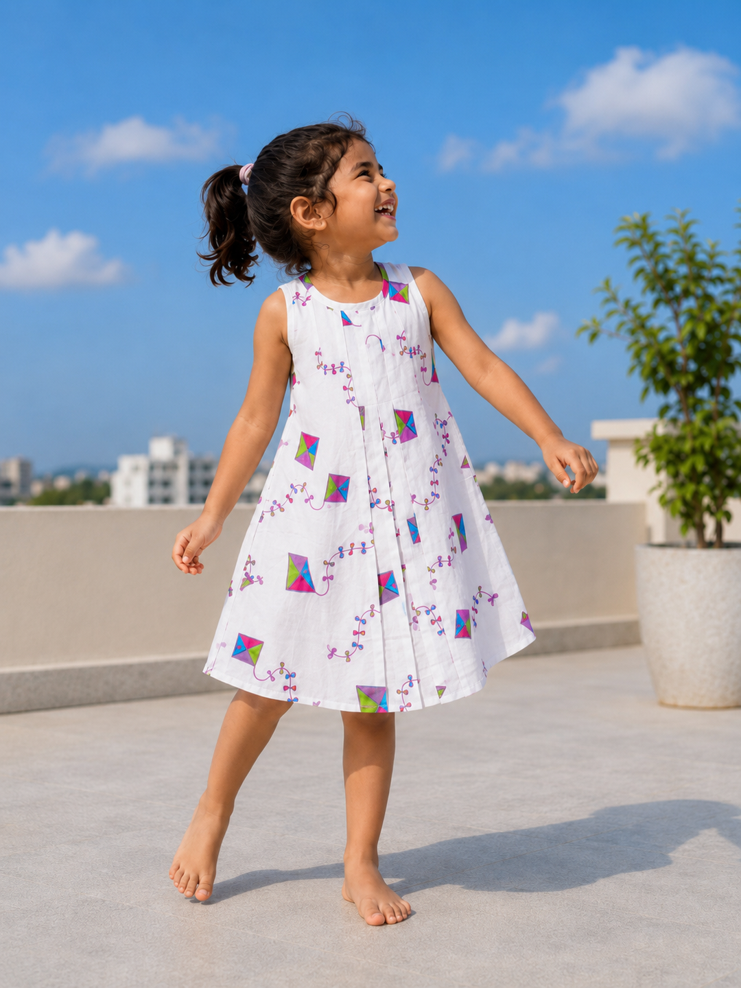 Girls cotton malmal dress in colourful kites print by Tura Turi