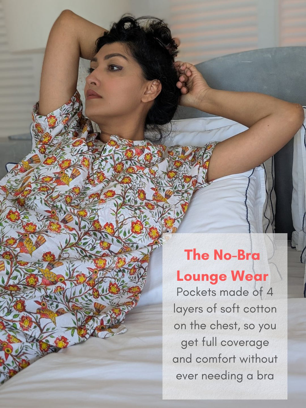 Woman wearing a floral no-bra lounge wear outfit on a bed with promotional text overlay.