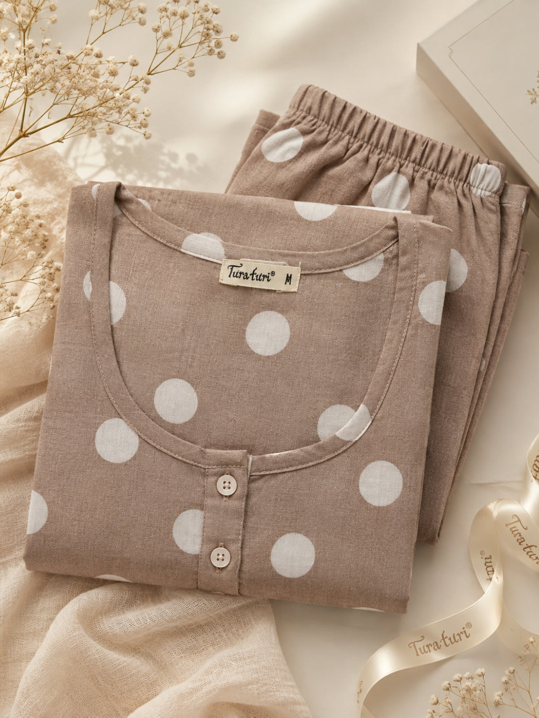 Folded Tura Turi mocha polka dot cotton night suit set with brand label in size M and ribbon, styled as a gift