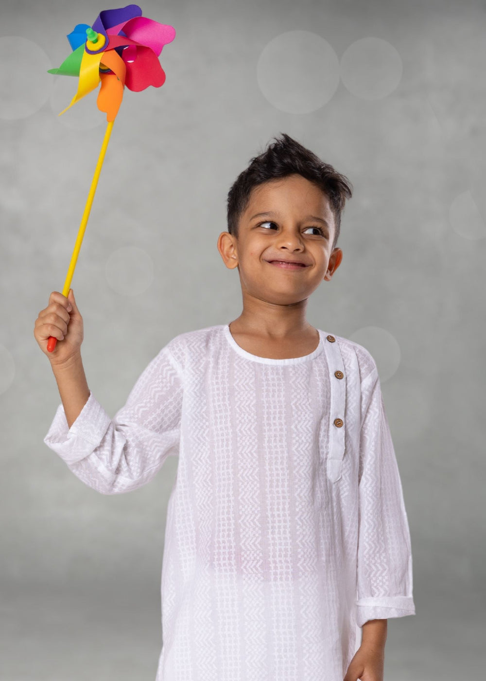 soft white kurta for boys with wooden button and self weave pattern