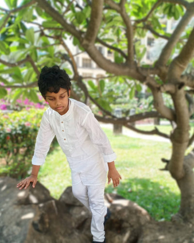 white boys kurta with natural wooden buttons