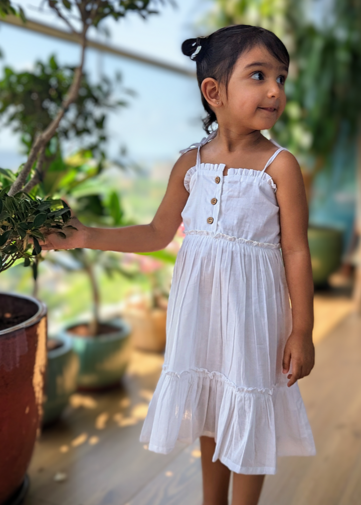 white cotton summer dress with spaghetti straps